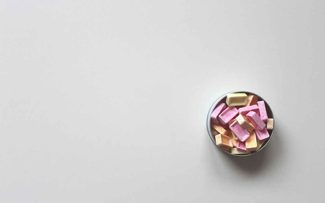 A hand-dipped dark chocolate cherry cordial with a jewel-like shine